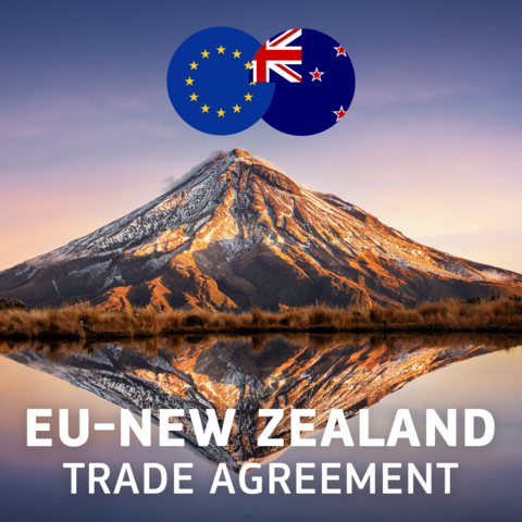 Reflection of Mount Taranaki on a lake, with the text above the image reading: EU-New Zealand trade agreement. Two circles enclosing the EU and NZ flags are also depicted above the mountain. 